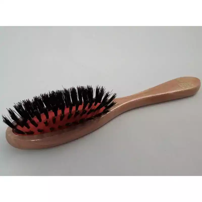 Brosse 2 en 1 pour le soin du poil chez les chats et les chiens